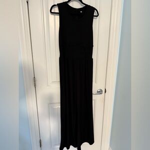 A Black Sleeveless Jumpsuit Crew Neck Cocktail